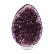 Kleines Amethyst Rainbow Ei mit natürlicher Druzy- Kristalloberfläche und Farbspiel aus Violett, Purpur und warmen Naturtönen.