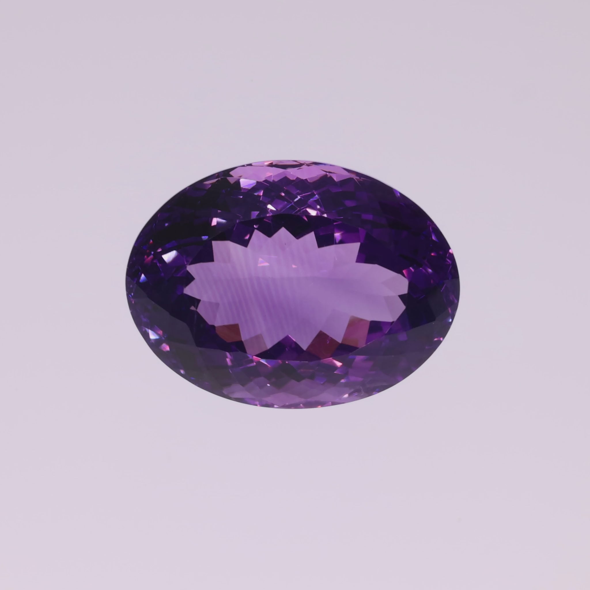 Video laden: 27,08 ct Amethyst Ovalschliff – Kristalline Klarheit in Tiefviolett aus Brasilien