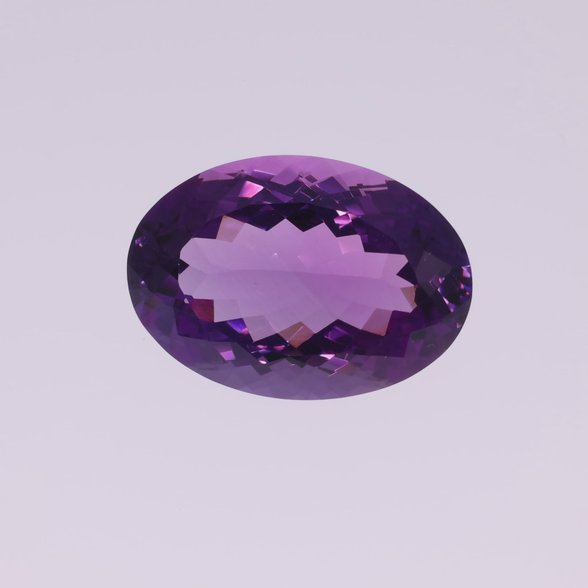 Video laden: 22,16 ct Amethyst Ovalschliff - Kristallklare Brillanz aus Brasilien