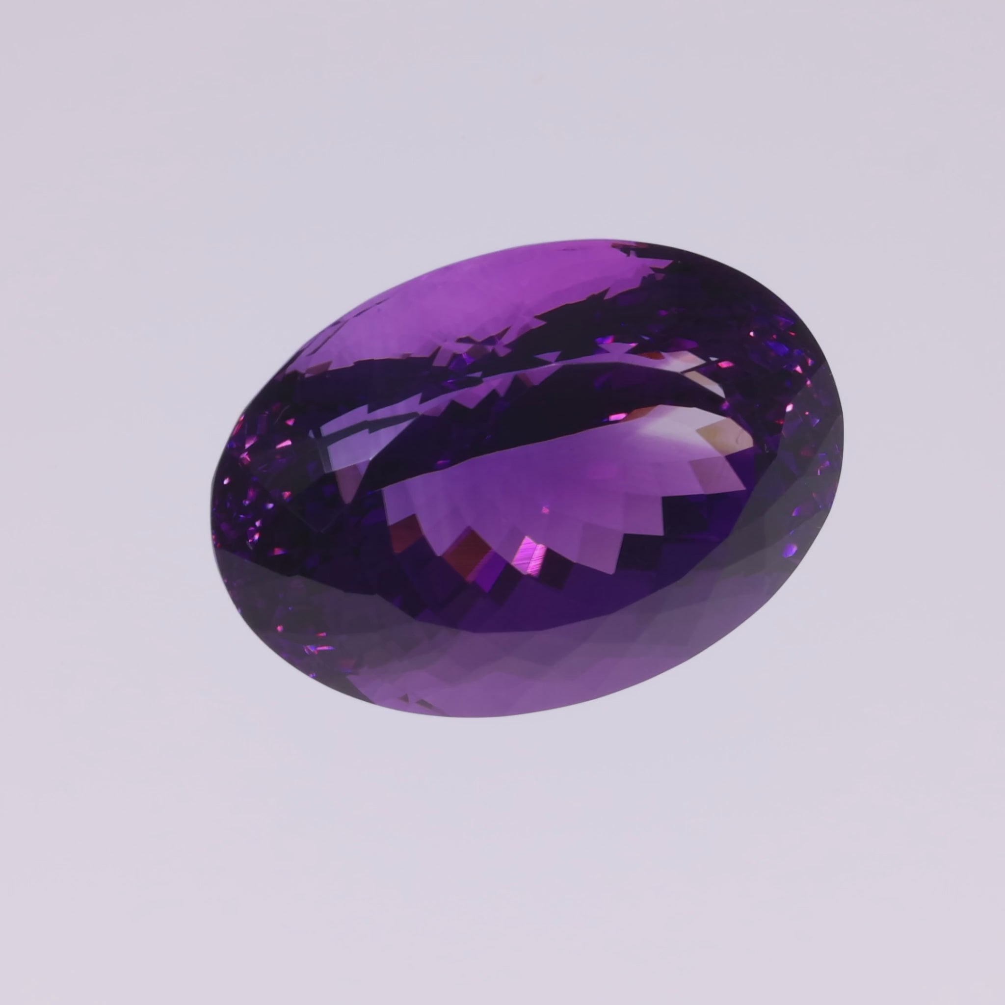 Load video: 43.28 ct Oval Cut Amethyst - Intense Play of Color