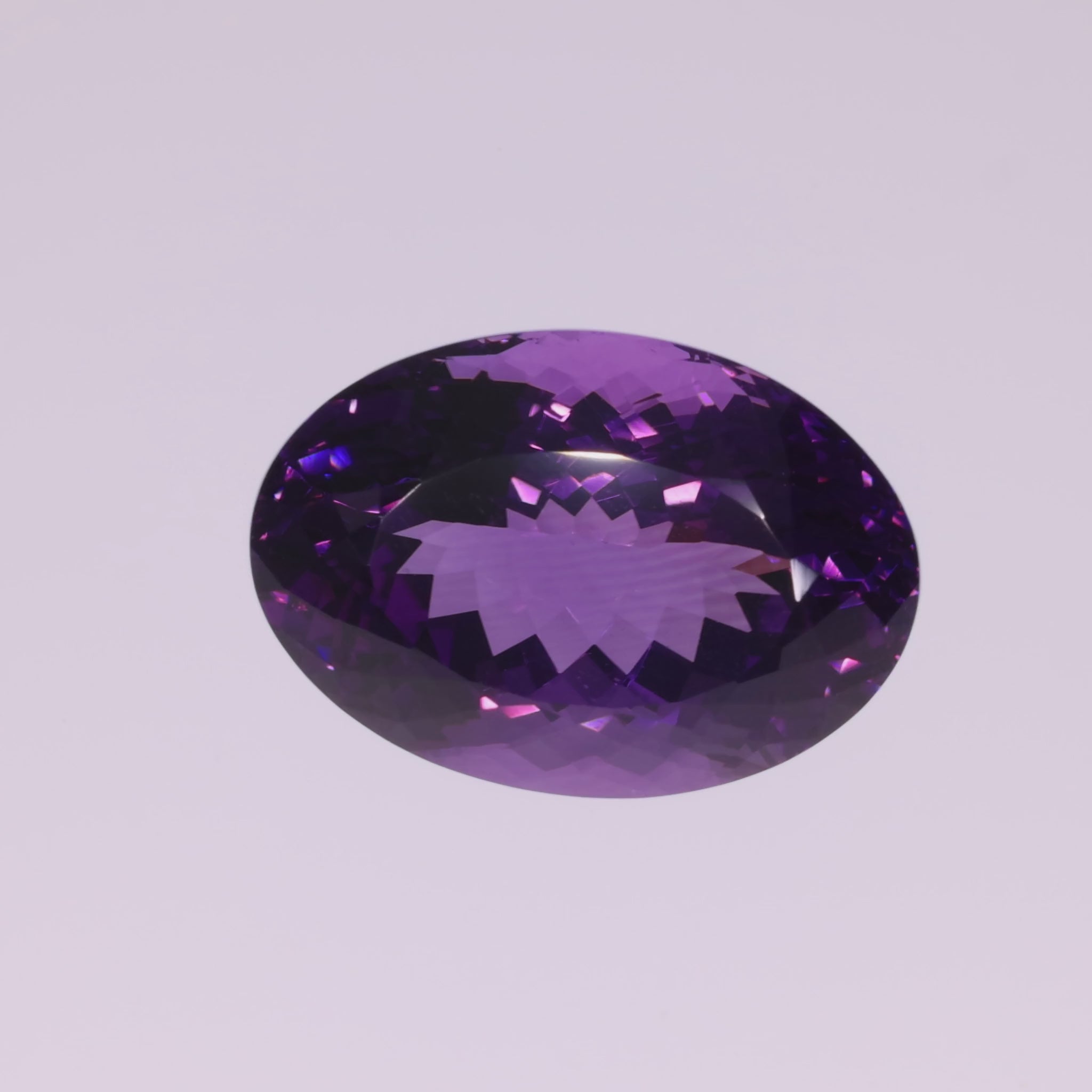 Load video: 29.78 ct Amethyst Oval Cut - Deep Violet from Brazil