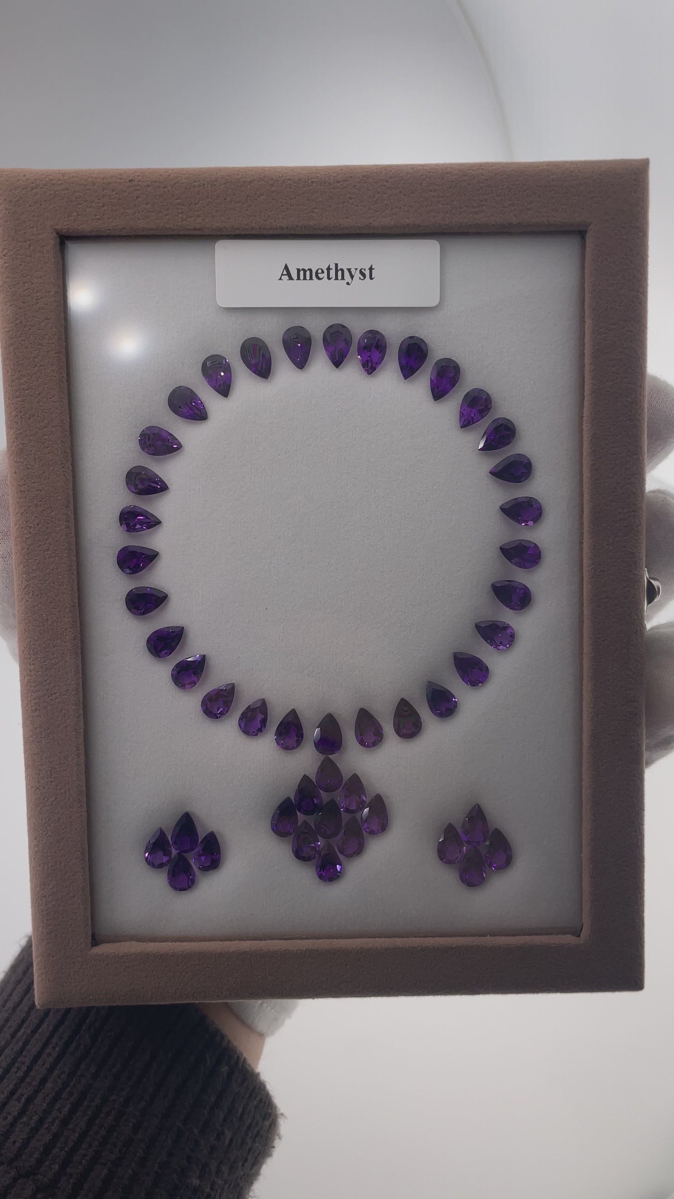 Load video: 52.39 ct Amethyst Set - 47 Pear Cut Gemstones - Deep Violet Drops